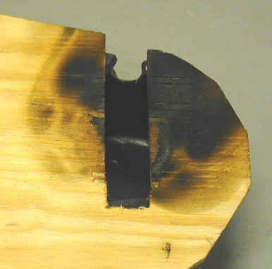 Scorched plywood pulley cover backing