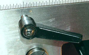 Locking lever for X-axis (one of two on each axis)