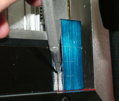 Scribing a reference line on the motor mount casting